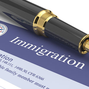 Fountain pen on top of immigration form - Serving Immigrants