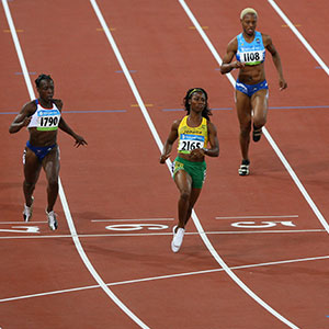 A group of women running on a track - Serving Immigrants