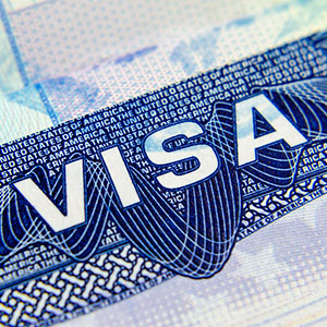 A close up of a visa - Serving Immigrants