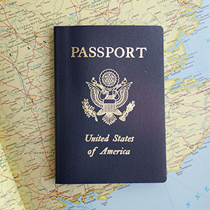A passport on a map - Serving Immigrants