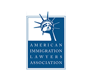 A blue and white logo with a statue of liberty - Serving Immigrants